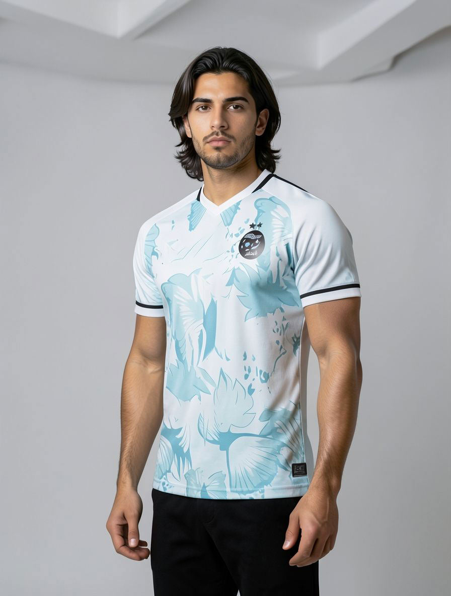 Maillot bleu de l'Algérie avec des oiseaux